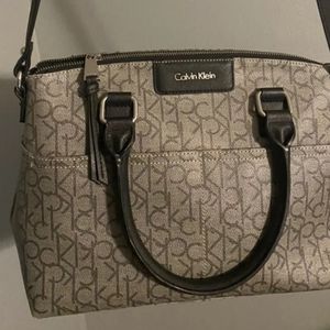 Calvin Klein shoulder bag. 15x10, 18" strap drop.